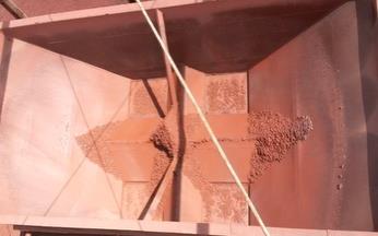 Haul-truck dump body after treatment — material releases cleanly